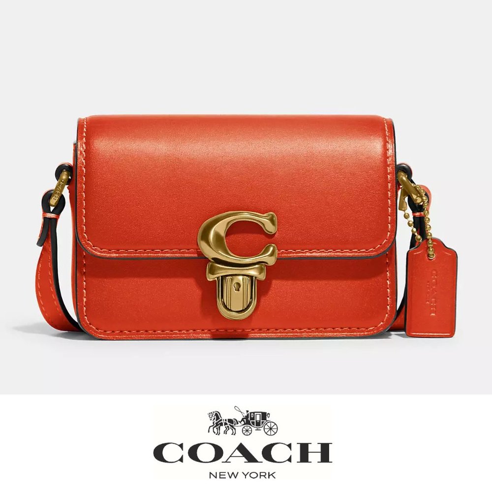 Coach orange Crossbody Bag with Gold Accents